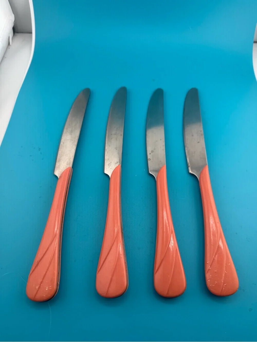 Fiestaware Coral Orange Handle Stainless Table Knives - Set of 4